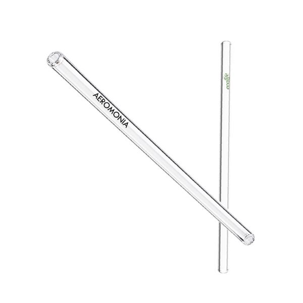 Two clear borosilicate glass straws crossed on a white background, one printed with a logo