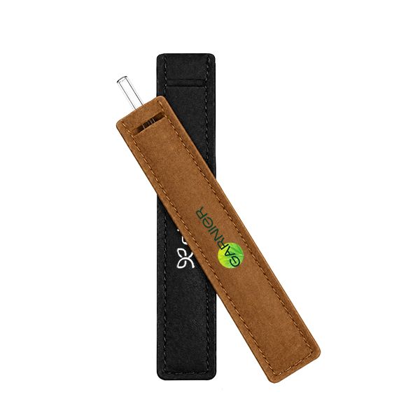 Glass straw inside a brown felt pouch resting on a black felt pouch, both printed with a logo
