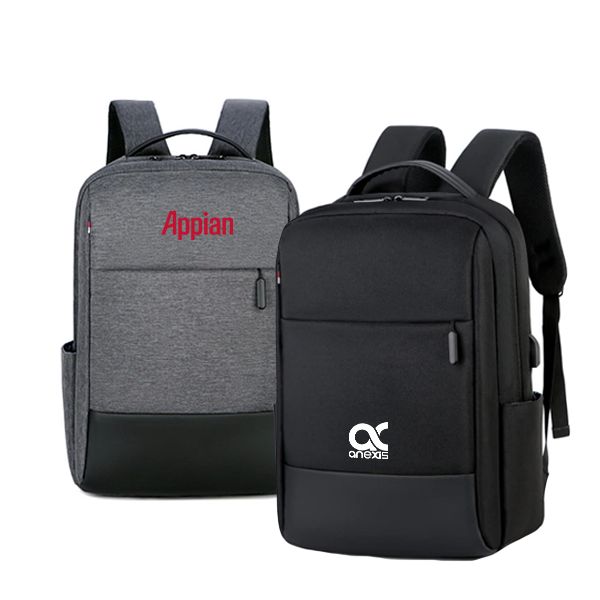 Grey backpack with a black base panel beside a black one with a front zip pocket and side USB port, both printed with a logo.