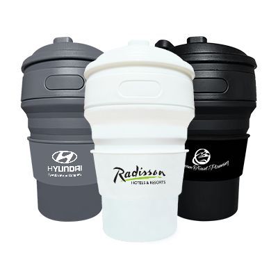 Three collapsible silicone cups with flip lids in grey, white and black, each printed with a logo.