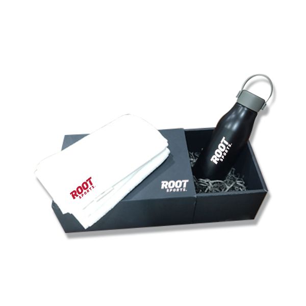 Black gift box holding a white towel, a black bottle and a black pouch, each printed with a logo