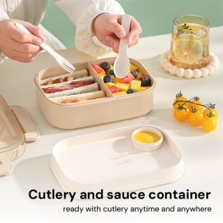 Two tier bamboo fiber lunch box with its cutlery and sauce container