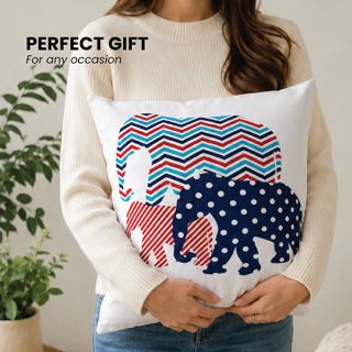 Woman holding custom shaped throw pillows printed with a patterned design