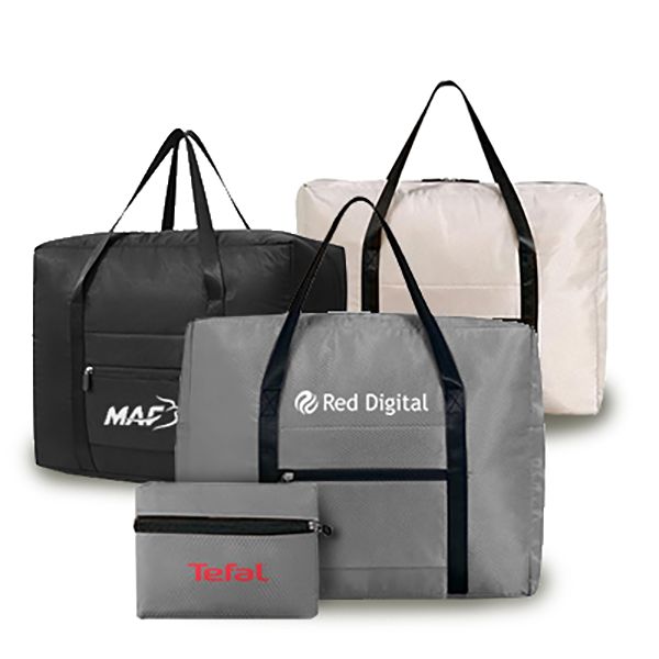 Foldable travel bags in black, cream and grey with black webbing handles, shown with two of them folded flat into pouches, printed with logos