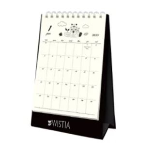 animal doodle desk calendar open at a monthly date grid, with a clear printing area below the dates