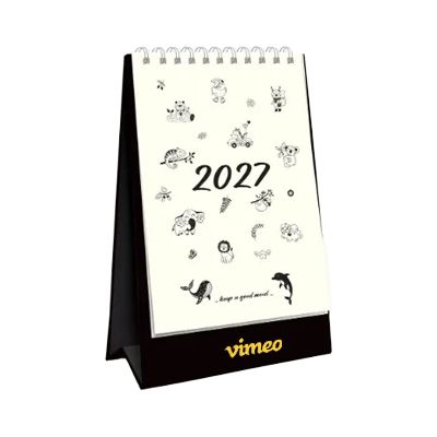 animal doodle desk calendar standing closed on its black card stand, cover showing line drawn animal doodles
