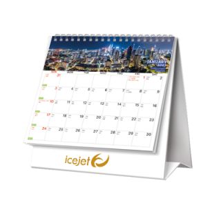 Malaysian Splendor desk calendar open at a monthly date grid, with a clear printing area below the dates