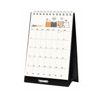 Meow Moments desk calendar open at a monthly date grid, with a clear printing area below the dates