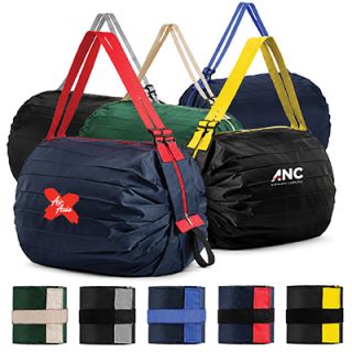 Rolled foldable shopping bags with red, beige, blue and yellow straps, some printed with a logo, above five folded flat squares in matching colours