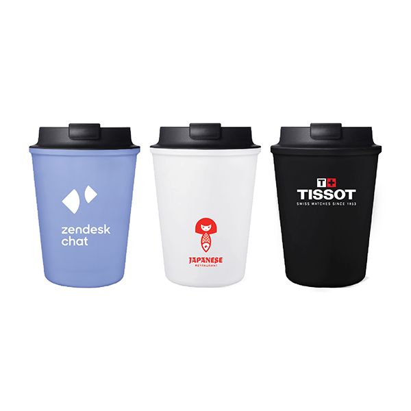 Three takeaway style plastic cups with black lids in periwinkle, white and black, each printed with a logo.
