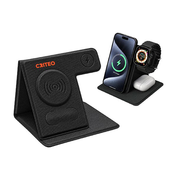 Black foldable 3-in-1 wireless charging stand holding a phone, a smartwatch and earbuds, printed with a logo